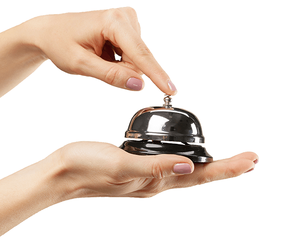 Hand ringing a hotel bell Hand ringing a hotel bell